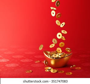Gold coins dropping on gold sycee ( yuanbao ) - red chinese fabric with oriental motifs background