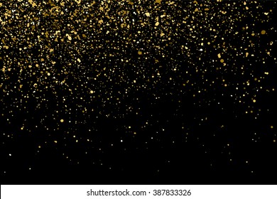 Gold glitter texture on black background. Golden explosion of confetti. Golden grainy abstract  texture on black  background. Design element. Bitmap illustration.