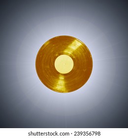 Gold Vinyl Record On A Blue Background