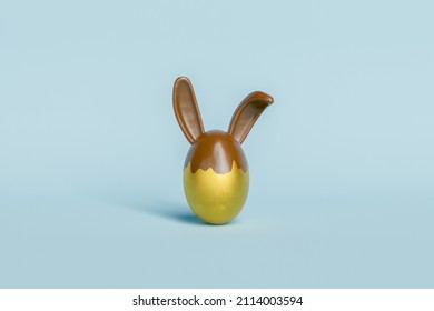 Golden Easter Egg With Chocolate Bunny Ears. 3d Rendering