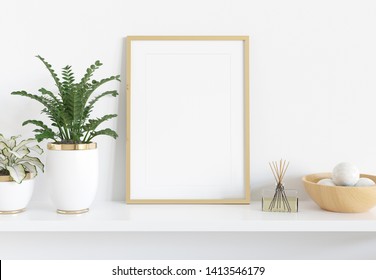 Golden frame leaning on white shelve in bright interior with plants and decorations mockup 3D rendering - Shutterstock ID 1413546179