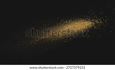 Golden glitter particles explode across a dark background