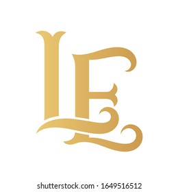 Golden LE monogram isolated in white.