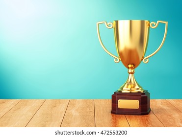 Golden Trophy Cup On Wood Table Over Blue Wall. 3D Illustration Of Sports Award Goblet