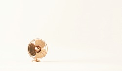 Golden Vintage Fan In Neutral Beige Colors Background . Trendy 3d Rendering For Social Media Banners, Promotion, Image. Light Background With Copy Space.
