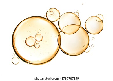 Golden Yellow Bubble Oil Or Serum Isolated On White Background