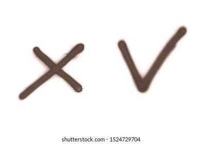 Graffiti check mark and cross sign sprayed on white isolated background. Approving and denying symbols painted in street art tag style in brown color