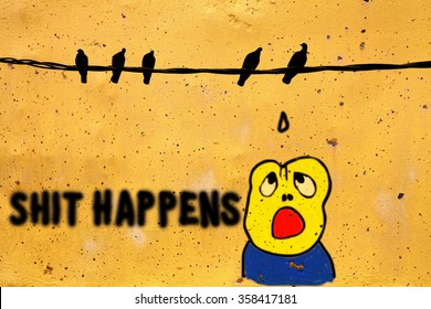 Graffiti of pigeons on a cable dropping excrement on a shocked boy with the quote: Shit Happens, on a orange color concrete wall.