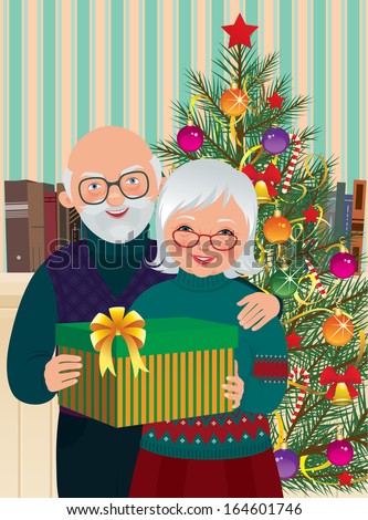 grandma and grandpa with christmas present under the christmas tree standelderly couple celebrating christmas - Grandpa For Christmas grandma and grandpa with christmas present under the christmas tree standelderly couple celebrating christmas - Grandpa For Christmas