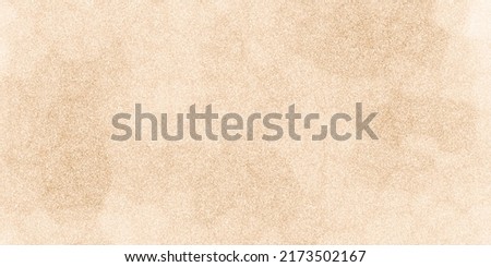 Graphic background of sand floor, top view or light brown beige gradient decorative wall background.