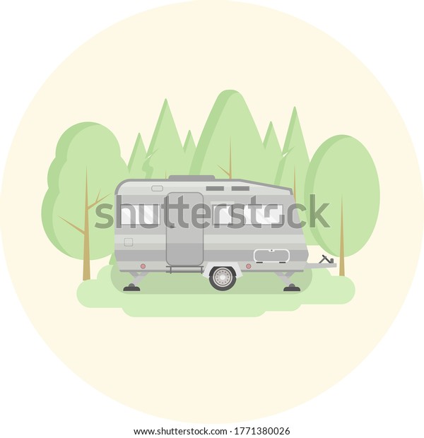 Graphic icon of camper trailer\
for traveling. Caravan on the background of green trees. Flat\
design.