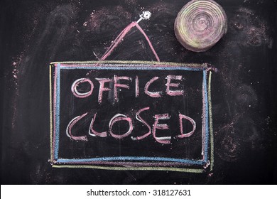 Graphic Representation Of The Word, Office Closed, Written With Chalk On Blackboard