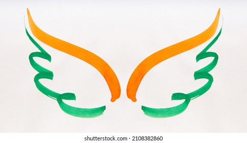 A graphic of a wing with bold brush strokes. Wing shape drawn with Indian national flag colors which connotes freedom and progress.