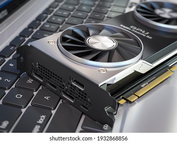 Graphics Card On Laptop Keyboard. Modern Gaming  GPU Graphics Processing Units.  3d Illustration