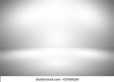 Gray empty room studio gradient with spotlight used for background and display your product