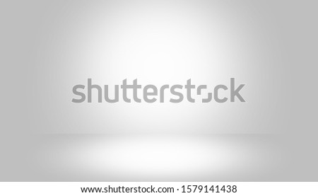 Gray empty room studio gradient with spotlight used for background and display your product