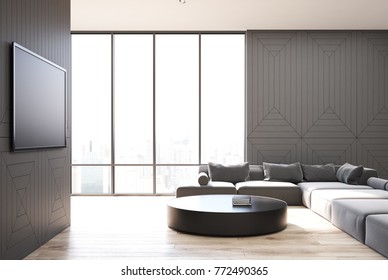 Gray And Wooden Living Room Interior With A Wooden Floor, A TV Set, A Round Table And A Gray Sofa. 3d Rendering Mock Up