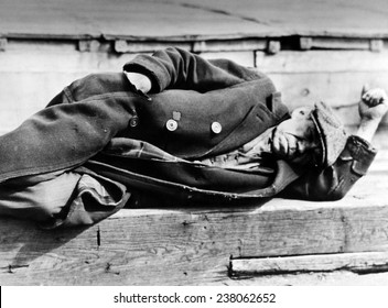 The Great Depression Idle Man Dressed In Worn Coat Lying Down On A Pier At The New York City Docks: Photo By Lewis W Hine