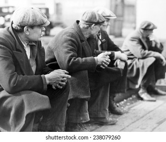 The Great Depression A row of out of work men at the New York City docks 1930s