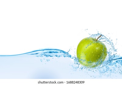 Green Apples Falling On The Water Surface