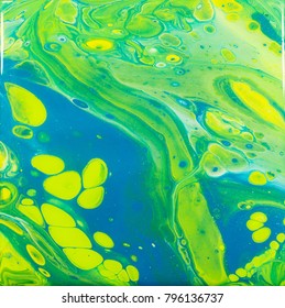 Green, Blue And Silver Acrylic Paint In A Chaotic 