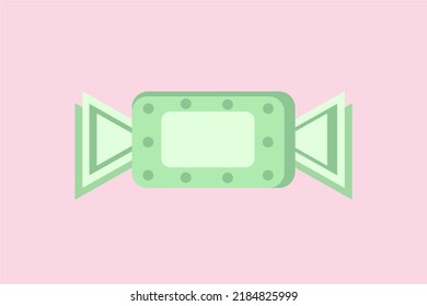 Green Candy Wrapper On Pink Background