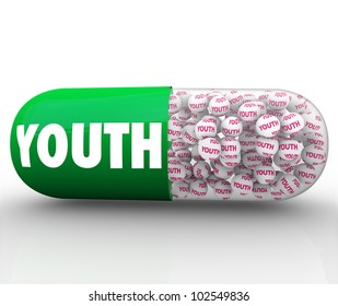 A Green Capsule Pill With The Word Youth To Suggest You Can Reverse The Aging Process And Be Young Instead Of Old With Medication That Makes You Feel Better And Younger