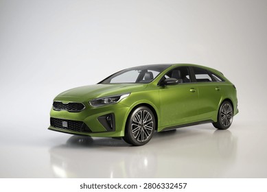 A green compact hatchback car with sleek design and modern features, positioned on a plain white background for automotive or transportation themes.