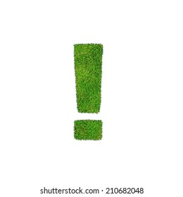 Green Exclamation mark made from grass isolated on white
