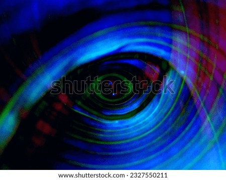 Green Eye abstract background texture with oval and lines curved shapes texture , red ,blue and dark color with smooth blur texture  