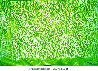 green paint abstract background, backdrop texture with strokes of green paint on the surface for overlay or design