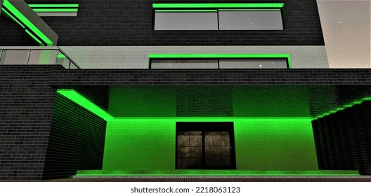 The Green Porch Illumination. Looks Stunning And Rich Especially At Night Time. Black Brick Tile Wall Finishing. 3d Rendering.