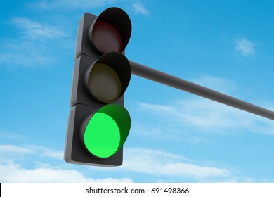 Green traffic light against blue sky. 3D illustration - Shutterstock ID 691498366