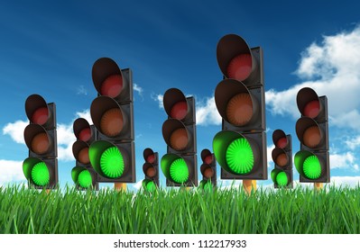 Green Traffic Lights Against Blue Sky Background