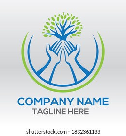 Green tree logo on human hand. nature icon and ecology concept