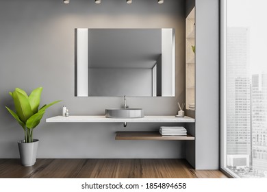 Grey Bathroom, Sink And Big Mirror With Shelves. Open Space Bathroom With Wooden Floor And Plant. Big Window With View On Skyscrapers, 3D Rendering No People