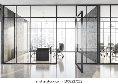 Grey Executive Room With Black Armchairs And Wooden Table. Office Minimalist Interior Behind Glass Doors, Front View, 3D Rendering No People