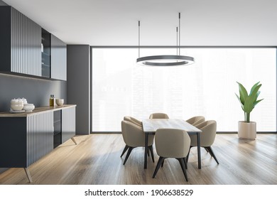 Grey Living Room With Commode With Dishes, Table With Beige Chairs Near Window And Plant, Side View, Parquet Floor. Open Space Dining Room 3D Rendering No People