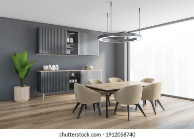 Grey Living Room With Commode With Dishes, Table With Beige Chairs Near Window, Side View, Parquet Floor. Open Space Dining Room 3D Rendering No People