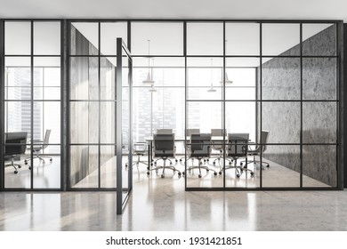 Grey marble conference room with black armchairs and table. Office minimalist interior behind glass doors, front view, 3D rendering no people