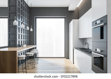 Grey And White Kitchen With Wooden Table And Bar Chairs, Parquet Floor And Window. Open Space Apartment With Dining Room, 3D Rendering No People