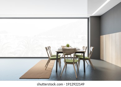 Grey And Wooden Dining Room With Wooden Chairs And Table Near Window, Side View. Eating Room With Minimalist Furniture On Grey Floor, 3D Rendering, No People