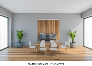 Grey and wooden living room with beige chairs and wooden table on parquet floor. Shelf on background, windows with plants, 3D rendering no people