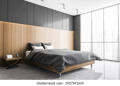 Grey And Wooden Sleeping Room, Bed On Grey Marble Floor, Side View. Minimalist Design Of Bedroom With Wardrobe And Windows With City View, 3D Rendering No People