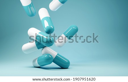 A group of antibiotic pill capsules fallling. Healthcare and medical 3D illustration background. Stock fotó © 