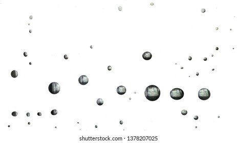 A group of bubbles in deep water, round shapes of different sizes are catching up to the top of the picture.