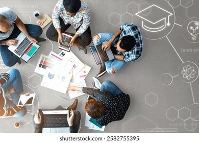 Group of diverse people collaborating with laptops and tablets, brainstorming ideas, and sharing creative concepts in a modern workspace setting. Team meeting and discussion.