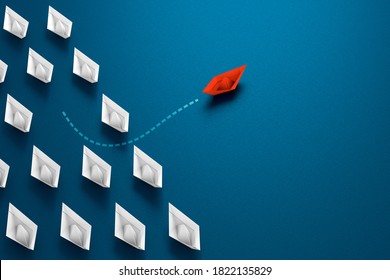 Group Of Paper Boats One Confident Paper Boat Change Direction  - Metaphor Individual Pointing In The Different Way. Business Concept New Idea Creativity And Different Innovative Solution