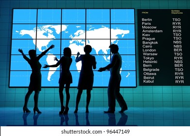 A group of people around the world map.