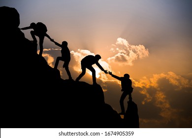 Group of people on peak mountain climbing helping team work , travel trekking success business concept - Powered by Shutterstock